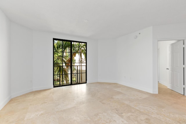 630 S Sapodilla Ave Unit 316, West Palm Beach, FL 33401 - empty room featuring baseboards
