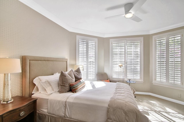 bedroom with crown molding, ceiling fan, and multiple windows