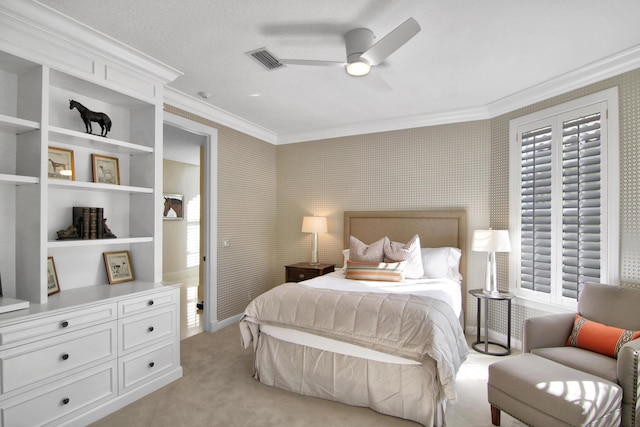 bedroom featuring crown molding, light colored carpet, and ceiling fan