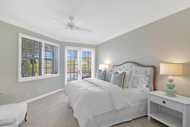 bedroom with ceiling fan, ornamental molding, and carpet flooring