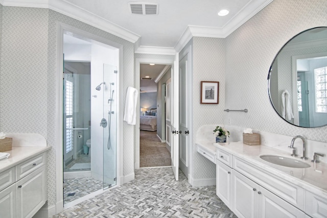 bathroom featuring walk in shower, ornamental molding, and vanity