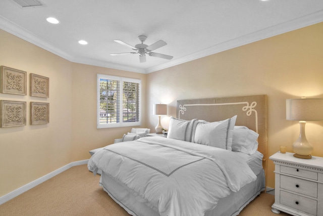 carpeted bedroom featuring ornamental molding and ceiling fan