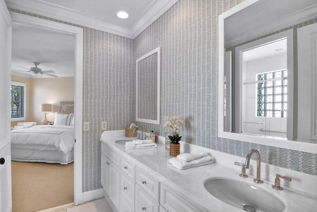 bathroom featuring vanity, ornamental molding, and ceiling fan