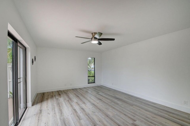 unfurnished room featuring light hardwood / wood-style flooring and ceiling fan