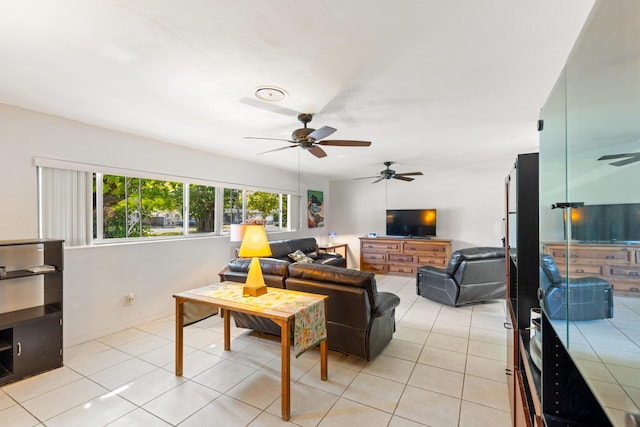 tiled living room featuring ceiling fan