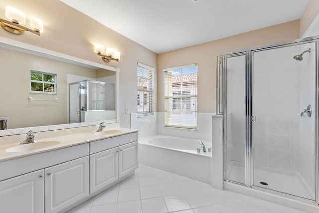 bathroom featuring vanity and separate shower and tub