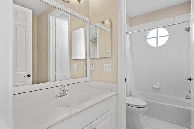 full bathroom featuring tile patterned flooring, vanity, shower / tub combo, and toilet