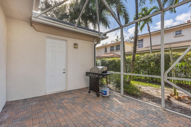 unfurnished sunroom featuring plenty of natural light