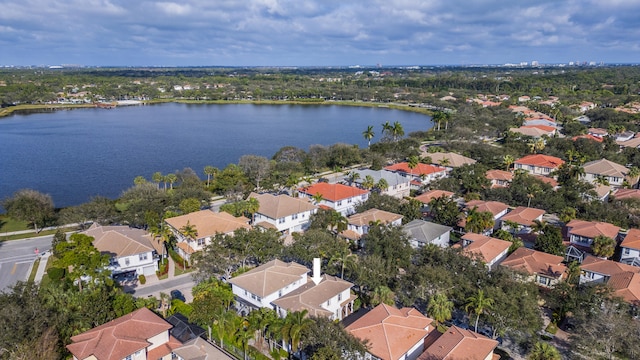 drone / aerial view with a water view