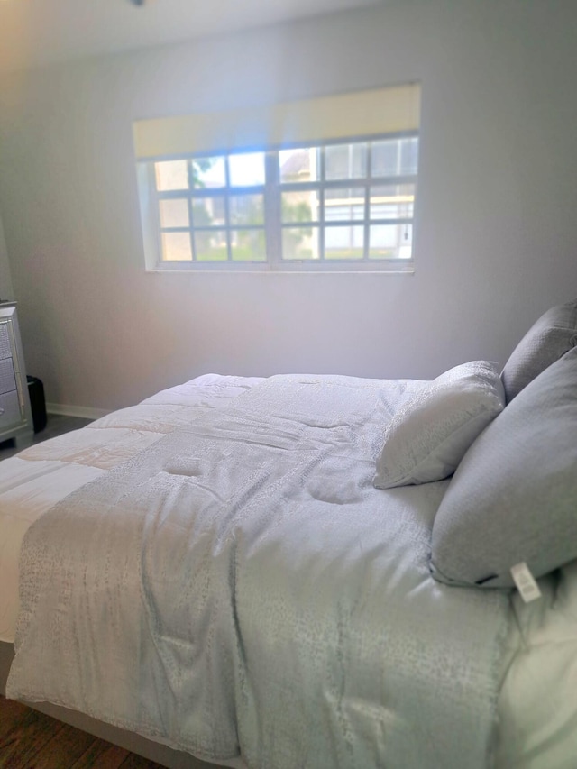 bedroom featuring hardwood / wood-style floors