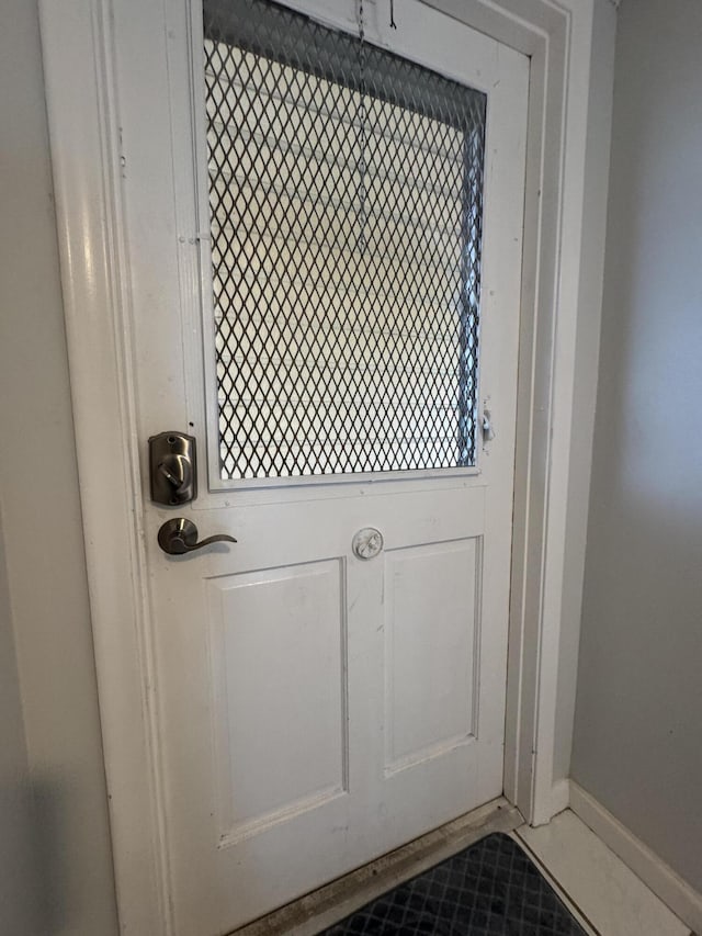 interior space featuring tile patterned flooring