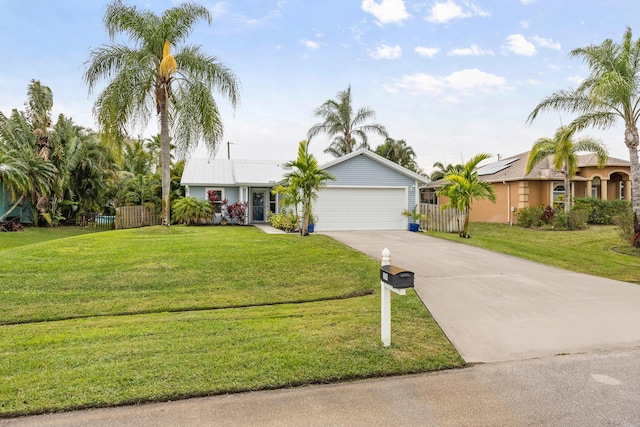 ranch-style house featuring a garage and a front yard