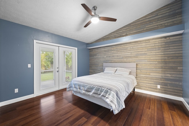 bedroom featuring access to exterior, vaulted ceiling, ceiling fan, and dark wood-type flooring