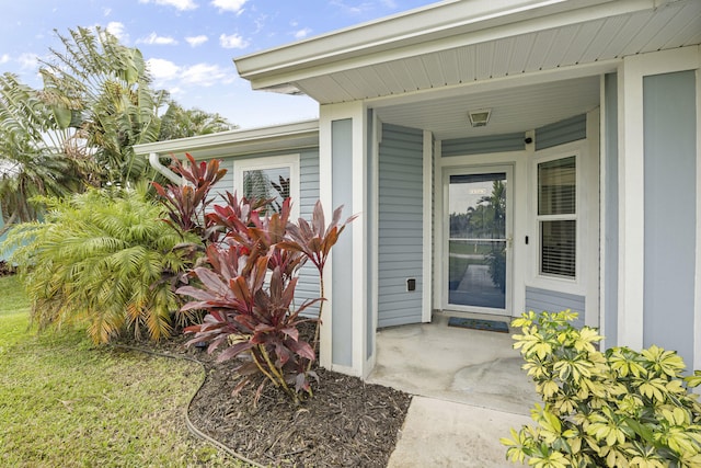 doorway to property featuring a porch