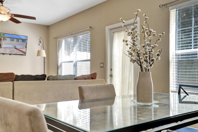 dining space featuring ceiling fan