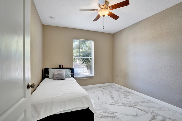 bedroom featuring ceiling fan