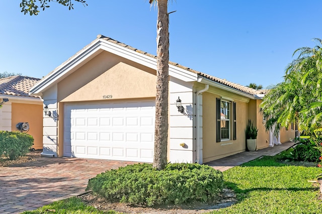 view of home's exterior featuring a garage