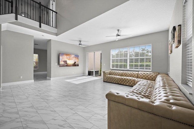 living room featuring ceiling fan