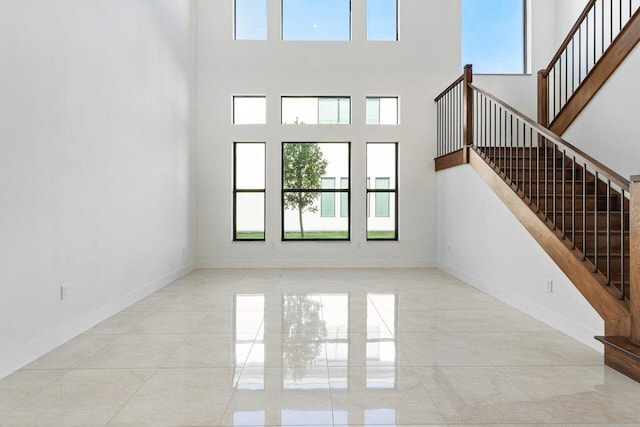 interior space with a towering ceiling