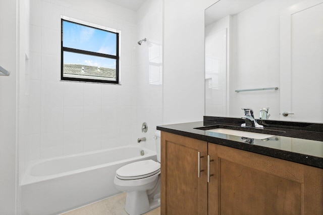 full bathroom featuring vanity, toilet, and tiled shower / bath