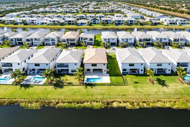 drone / aerial view featuring a water view