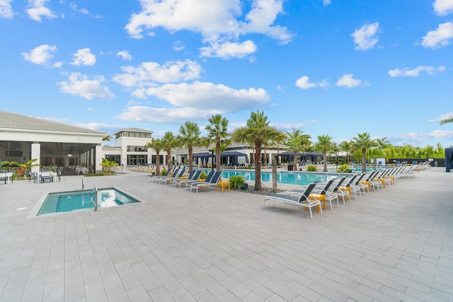 view of swimming pool featuring a patio area