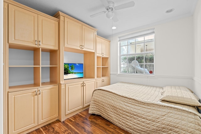 bedroom featuring ceiling fan and dark hardwood / wood-style floors