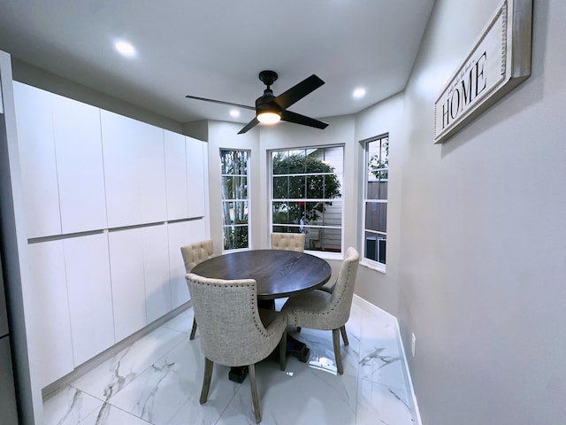 dining area featuring ceiling fan