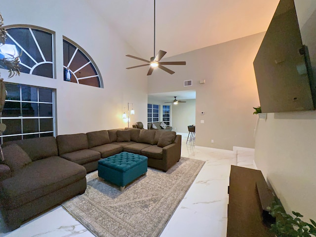 living room featuring visible vents and marble finish floor