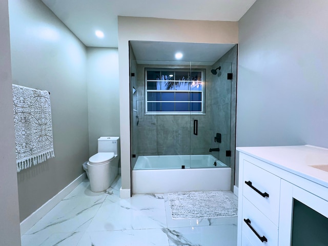 full bathroom with toilet, vanity, and shower / bath combination with glass door