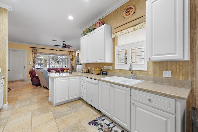 kitchen featuring white cabinets, dishwasher, sink, ornamental molding, and ceiling fan