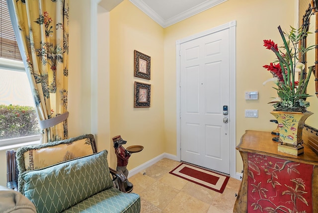 entryway featuring crown molding