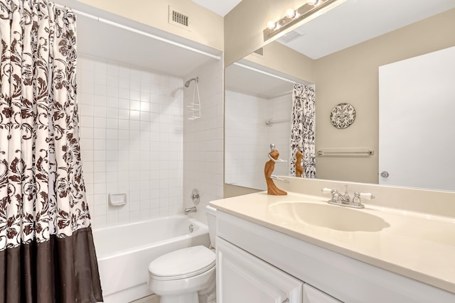 full bathroom with shower / bath combo, vanity, and toilet