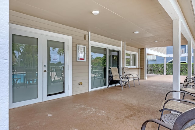 view of patio featuring french doors