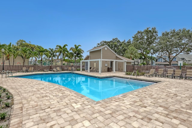 view of swimming pool featuring a patio