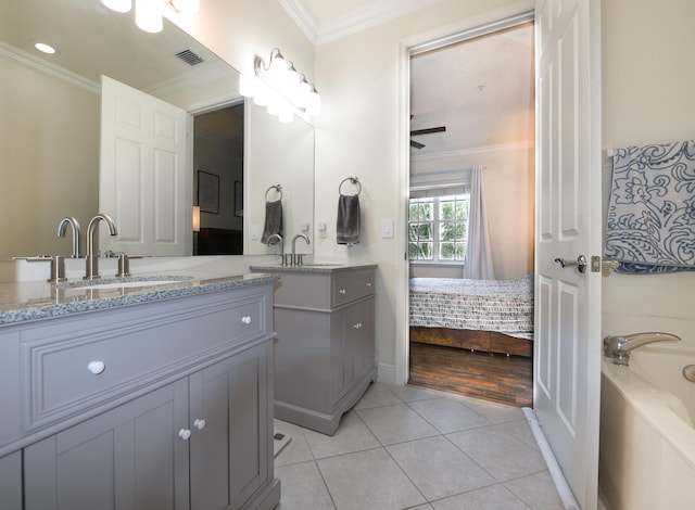 bathroom with tile patterned flooring, vanity, ceiling fan, and ornamental molding