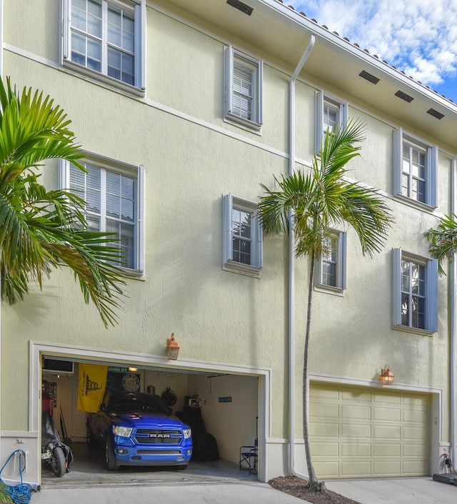 view of property exterior featuring a garage