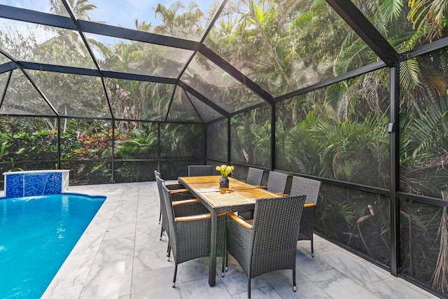 view of patio / terrace featuring a lanai and pool water feature