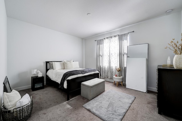 carpeted bedroom featuring a closet