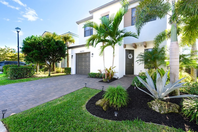 view of front of property with a garage