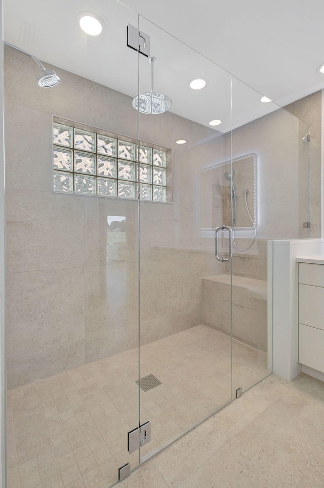 2371 SW Brookwood Ln, Palm City, FL 34990 - full bathroom with a stall shower, recessed lighting, vanity, and tile patterned floors