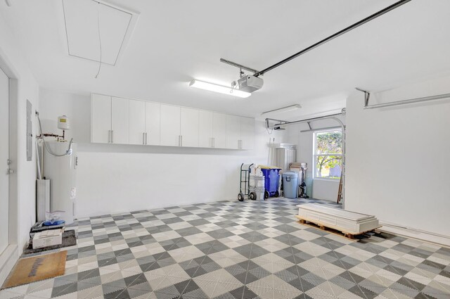 2371 SW Brookwood Ln, Palm City, FL 34990 - garage featuring a garage door opener