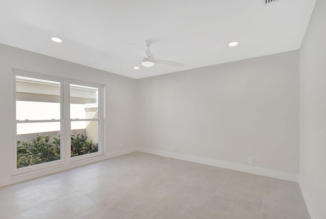 empty room featuring ceiling fan