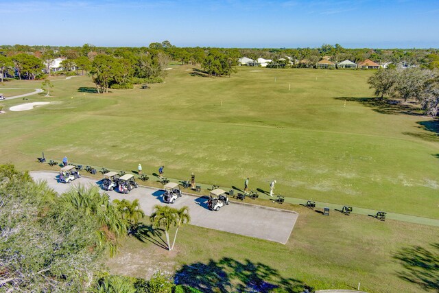 2371 SW Brookwood Ln, Palm City, FL 34990 - bird's eye view of a golf course and a tree filled landscape