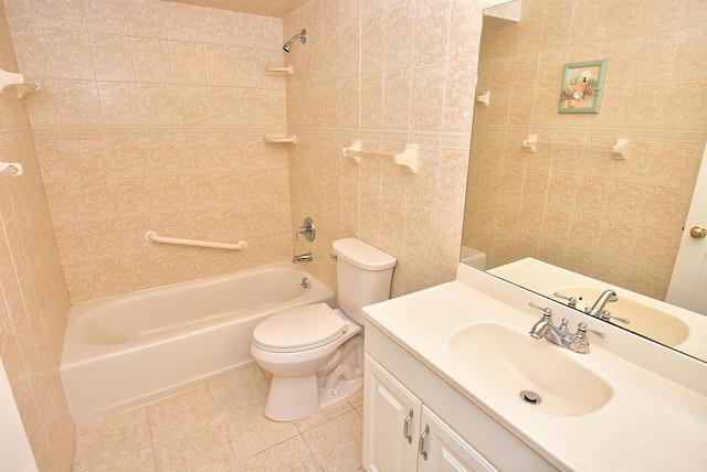 1225 NW 21st St Unit 3406, Stuart, FL 34994 - full bath featuring tile patterned floors, toilet, shower / tub combination, tile walls, and vanity