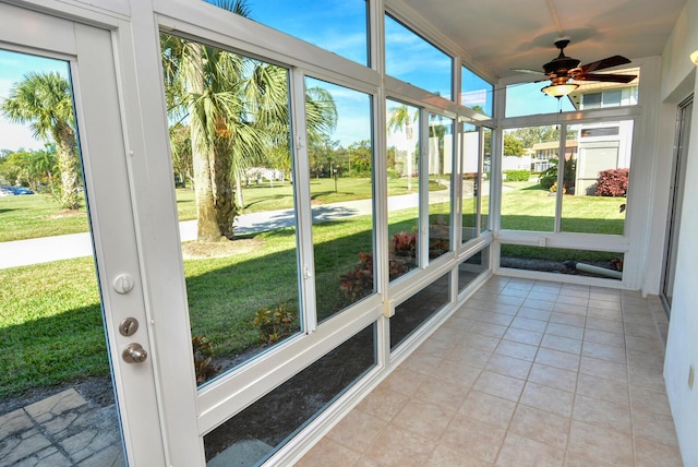 1225 NW 21st St Unit 3406, Stuart, FL 34994 - unfurnished sunroom featuring a ceiling fan