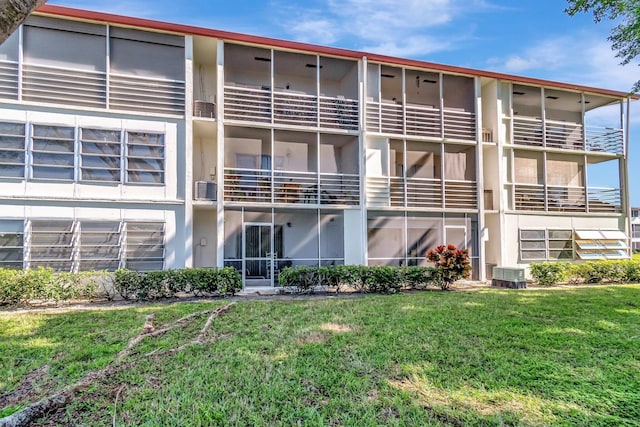 view of building exterior featuring cooling unit