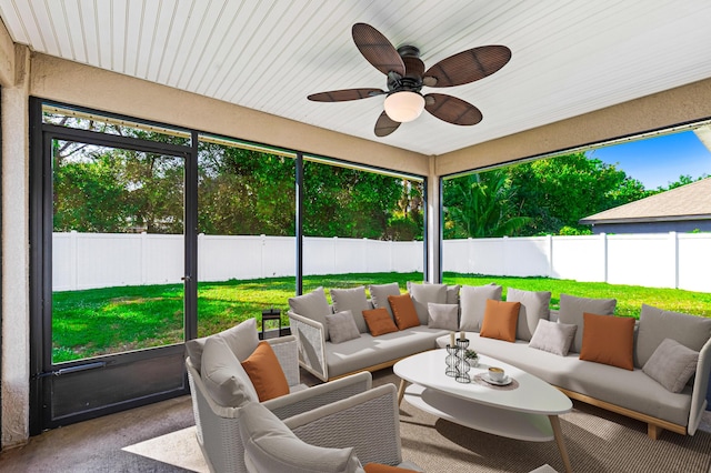 sunroom / solarium with ceiling fan