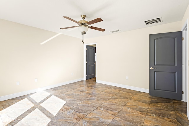 unfurnished room featuring ceiling fan