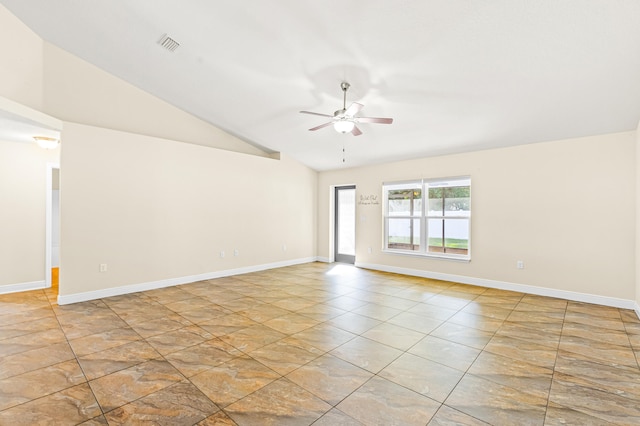 empty room featuring ceiling fan and lofted ceiling